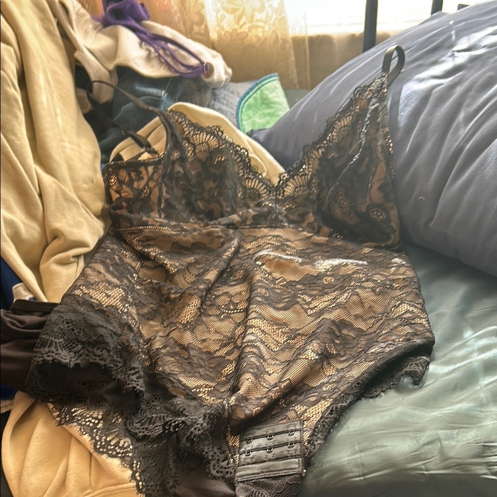 Black Lace Bra with Sheer Material and Intricate Floral Design